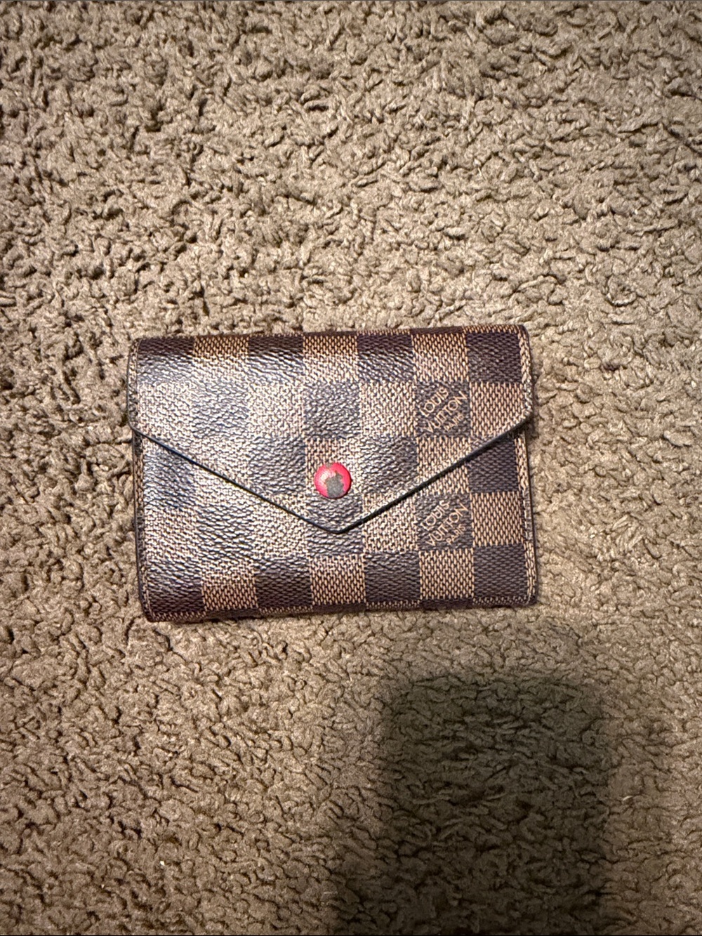 Brown Check Envelope Wallet with Red Snap the only scratch it’s the red snap